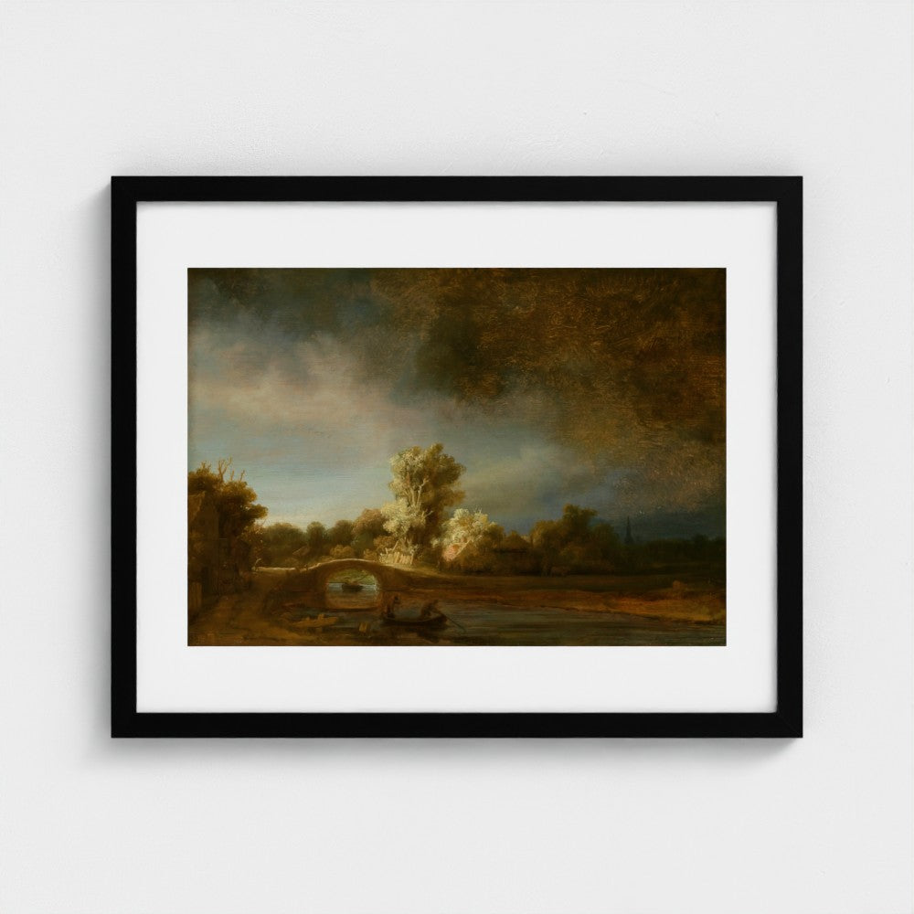 Landscape with a Stone Bridge by Rembrandt van Rijn in a black frame